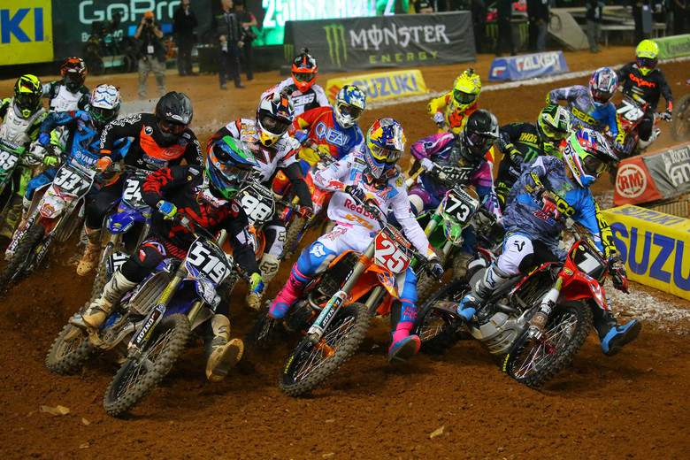 GEICO Honda's Justin Bogle (1) went wire-to-wire in his heat race. 250 series points leader, Marvin Musquin (25), had a brief off-bike excursion, but qualified easily aboard his Red Bull KTM.