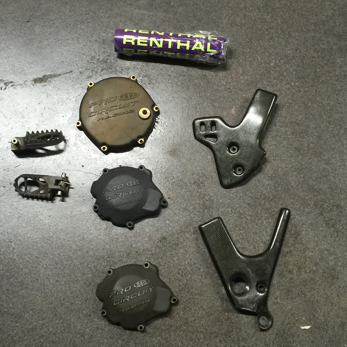 9602 Kx 250 PC ignition cover, renthal flo and purple bar pad, 9603