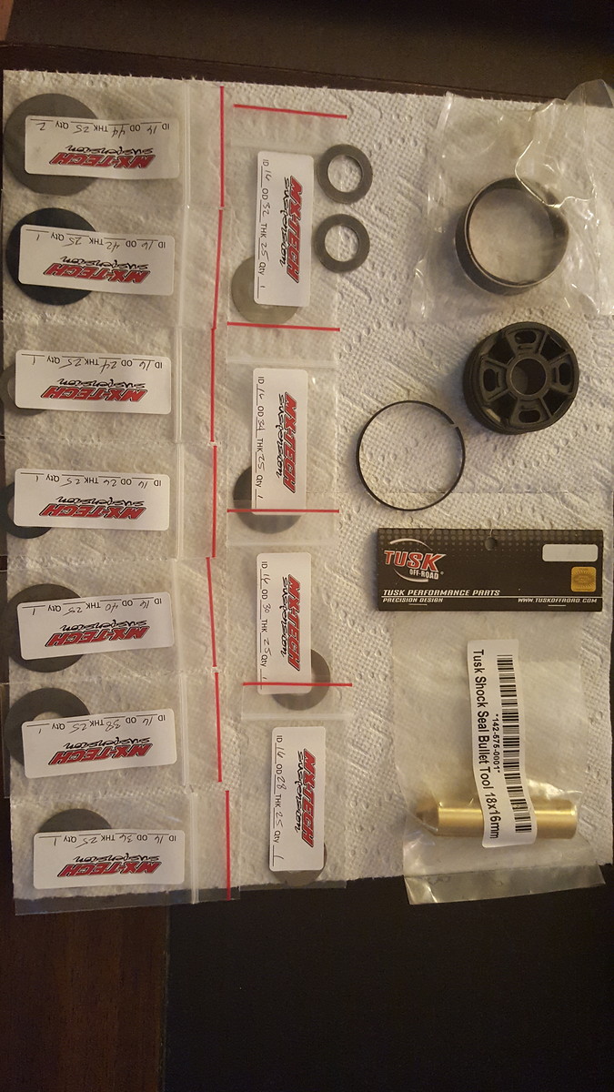 Showa 16 x 50mm works shock piston, shims and tools MotoRelated