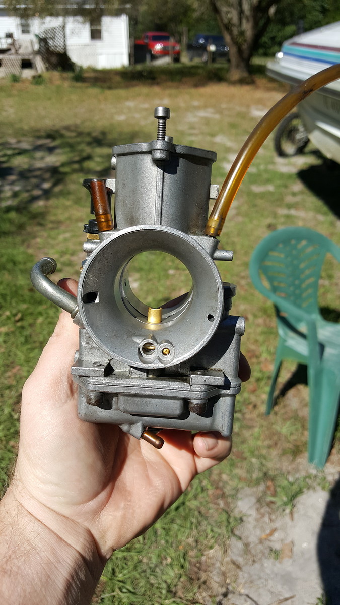 **0106 RM125 carb throttle slide or complete carb wanted!! For Sale