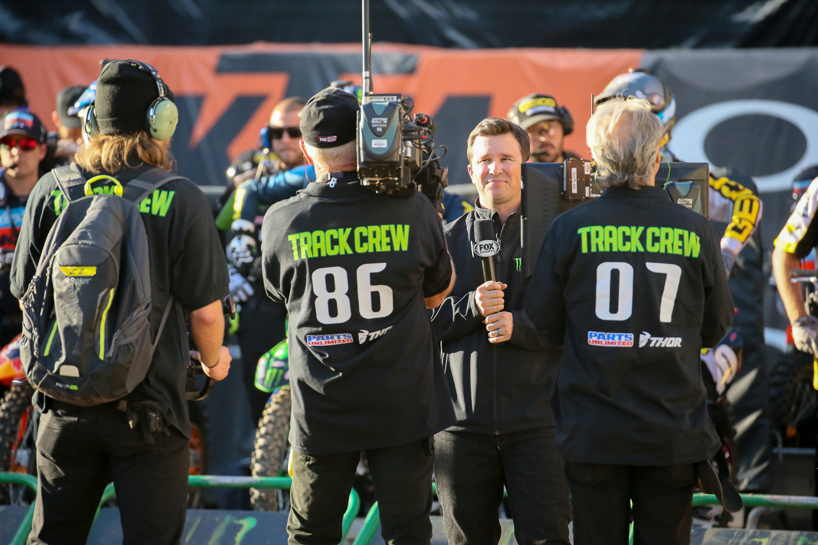 It takes a crew to do the remotes from the floor. Here's Daniel Blair with his small tribe. There's generally the cameraman, a lighting person, and one crew member with a remote playback monitor.