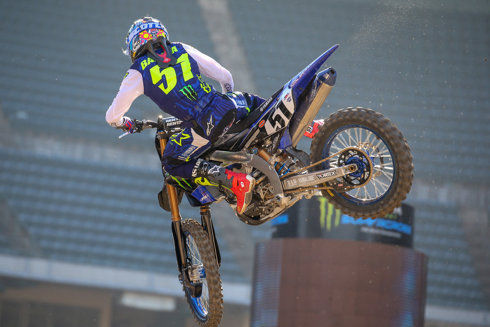 Check out Justin Barcia...and the stream of muffler packing particles trailing behind his Yamaha.