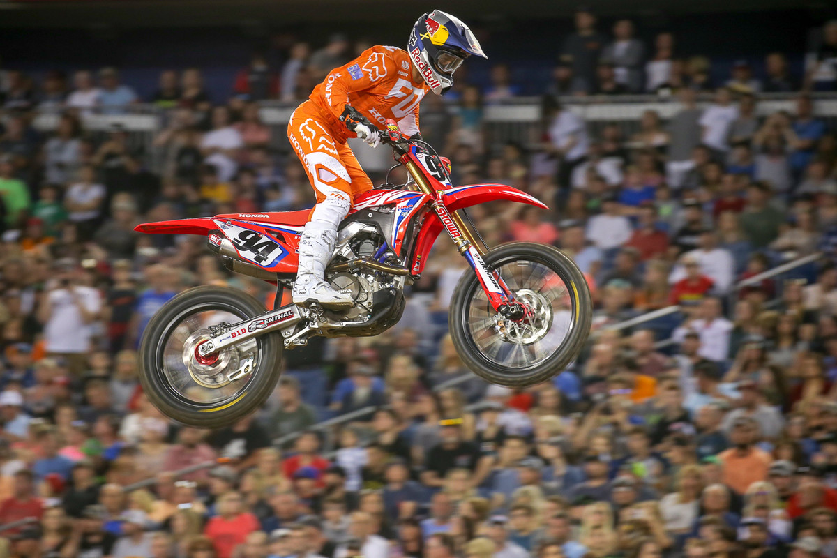 Ken Roczen took the win in the second 450 heat, but got tangled up in Joey Savatgy's crash in the main, which sent him over a berm. Luckily no one was going by in the sweeper on the other side of it. After climbing back over and remounting, he ended up with an eighth for the night.
