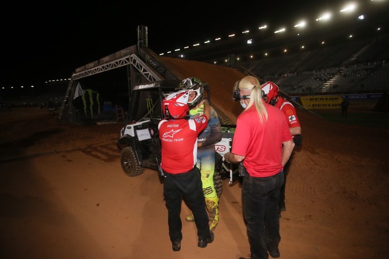 Cameron McAdoo talking with the medical crew after a scary crash that red flagged the first Main Event start.